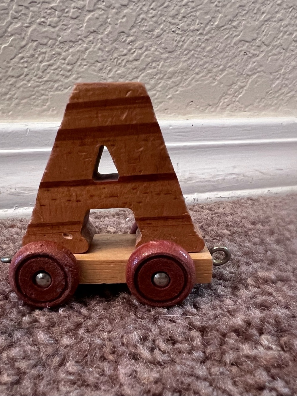Wooden Letter A Pull Toy - Brown/Red Wheels
